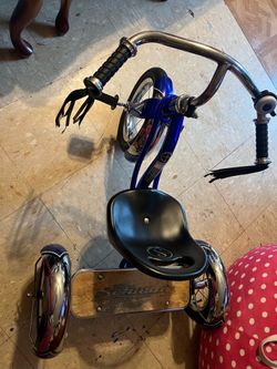 Blue Schwinn Roadster Tricycle