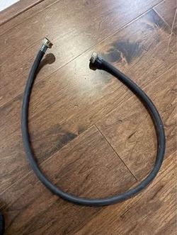 heavy-duty reinforced rubber utility black hose with metal connector suitable for various uses