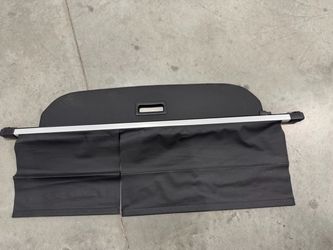Genuine OEM 2022-24 Mitsubishi Outlander Rear Black Retractable Tonneau Cover.