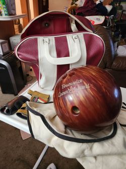 Used Bowling Ball  & Bag & 2 wrist guards & Ball Shine Rag  Not Sure of the Weight