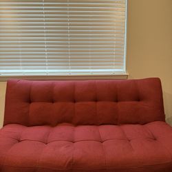 Tuffed Red Futon Convertible to Bed