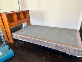 Twin bed frame with bookshelves