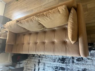 2 small couches brown