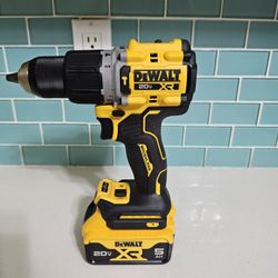 DeWalt hammer drill model number DCD 806 brand new never used also comes with a Brand New 5.0 DEWALT Battery.