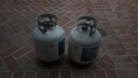2 empty propane tanks