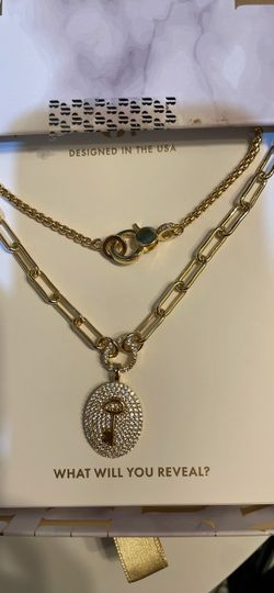 Bomb party looks layers, 2 Chainz gold with cubic, zirconia with a key pendant