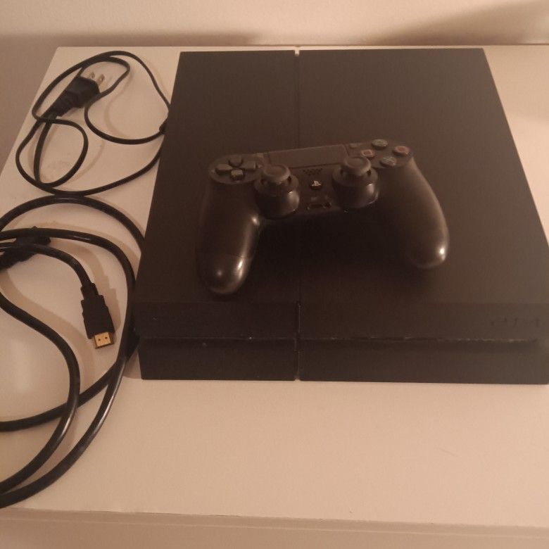 Black PlayStation 4. Practically New, Used Minimally