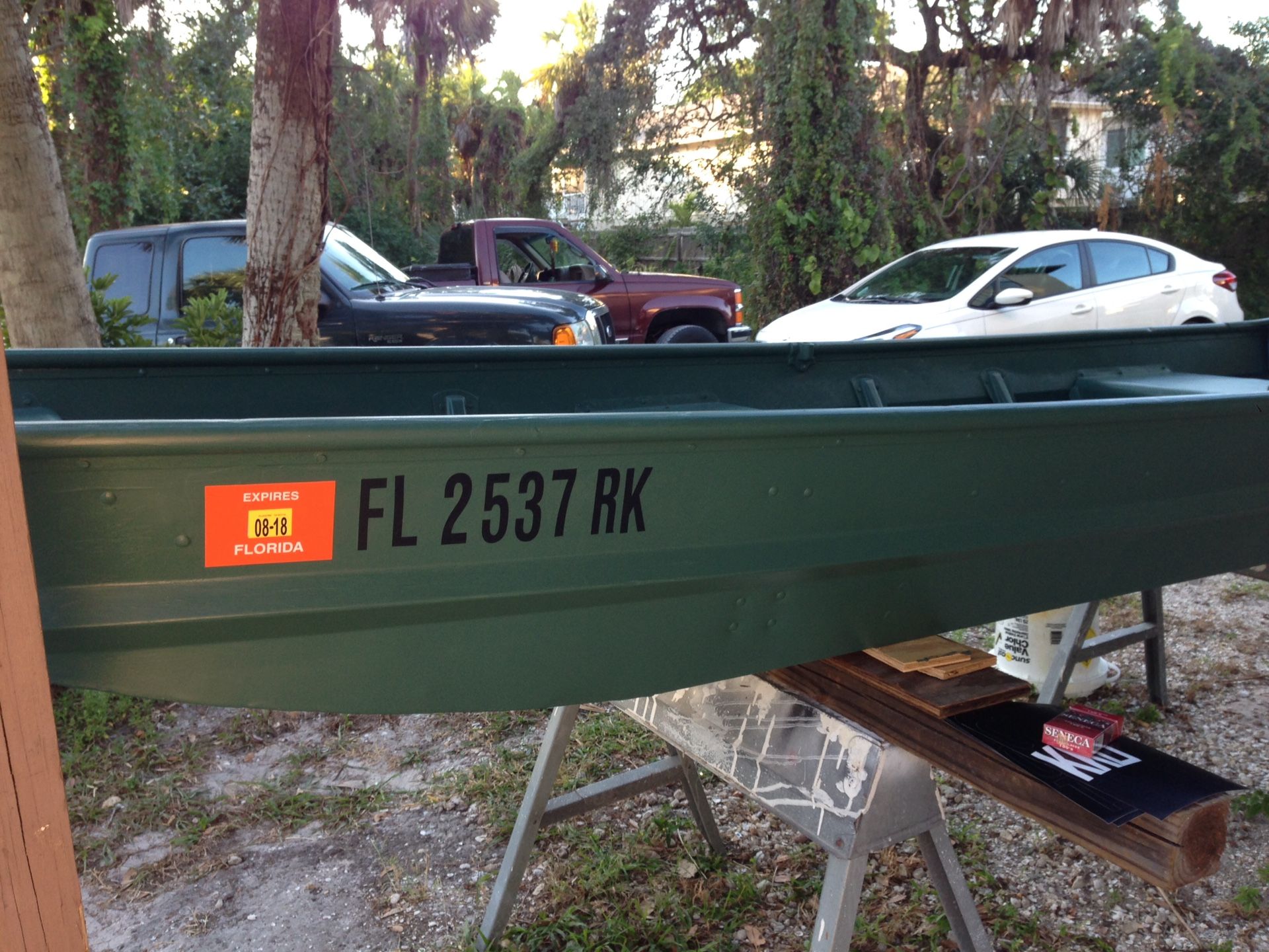 12 ft john boat with 4-1/2 hp mercury and trolling motor and accessories 650.00
