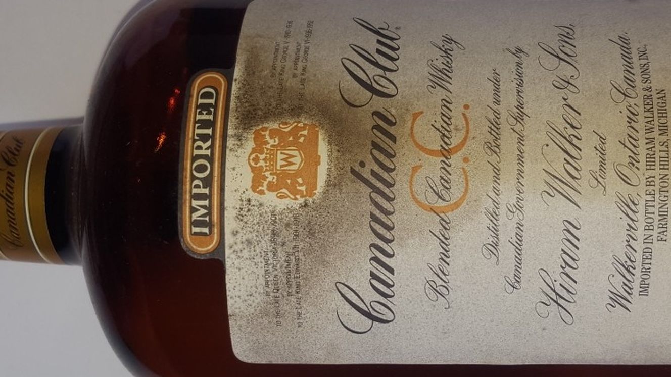 Empty 1984 Canadian Club Whiskey Bottle
