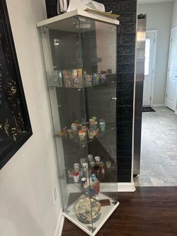 Glass and white shelf with door