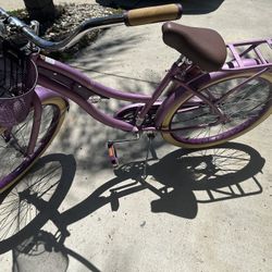 Two Bikes And Some Roller Skates For Sale