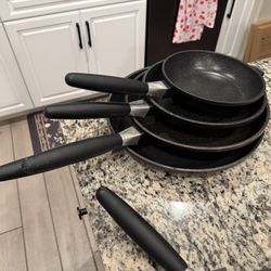 set of used pots and pans
