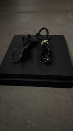 Sony PlayStation 4 Slim Console with Cables
