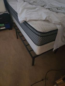 Entertainment center and full bed