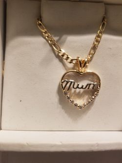 Cadena con dige de mon de oro laminado