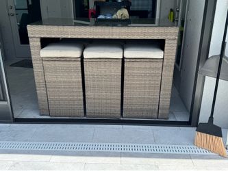 Patio table and 6 stools