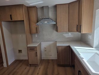 Warm Wood Kitchen with Waterfall Island