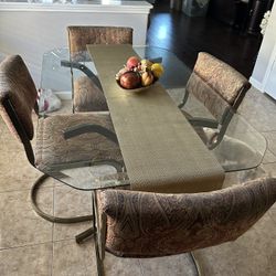 Glass Top Dining Table With 4 Upholstered Chairs 60” x 36”