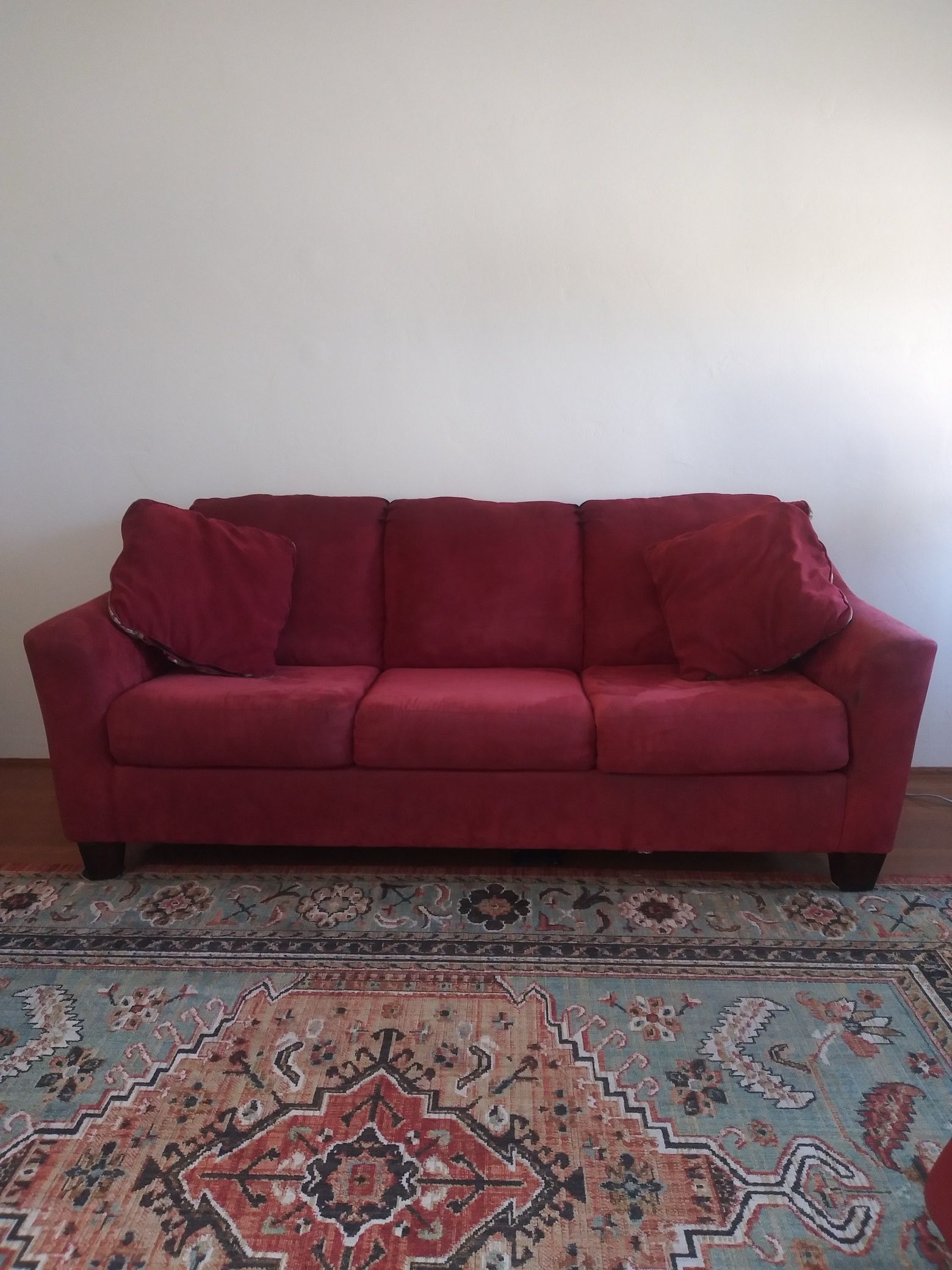 Red sofa with pull out sleeper