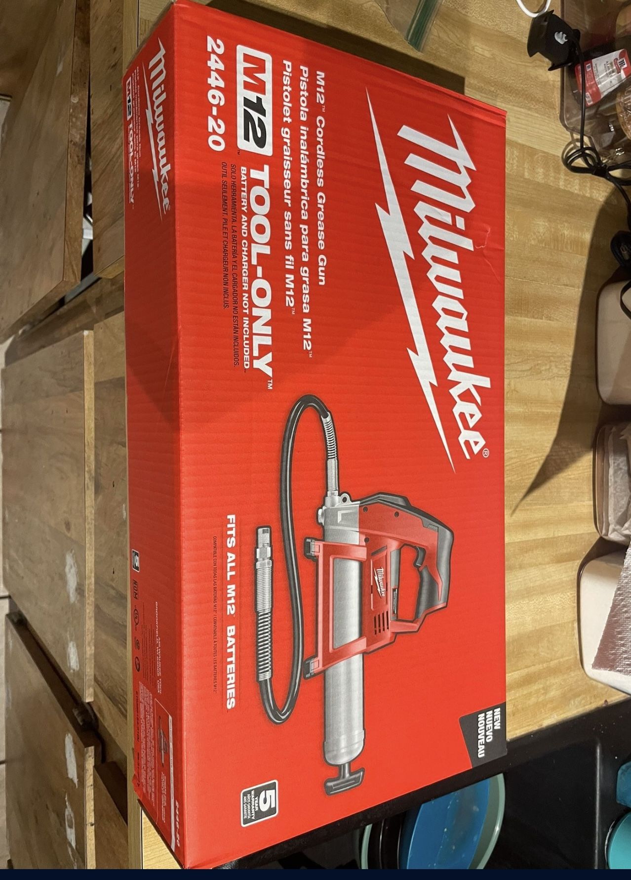 New Milwaukee M12 grease gun with 1.5 ah batt and charger new $200 located in n Lakeland