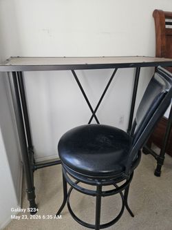 Tall desk with swivel stool