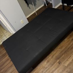 Futon In Great Condition And Sets Into A Bed Great For Any Household 