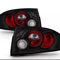 2000-2006 AUDI TT SPYDER BLACK TAILLIGHTS, BRAND NEW AND IN THE BOX