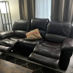 Burgundy, leather reclining couch