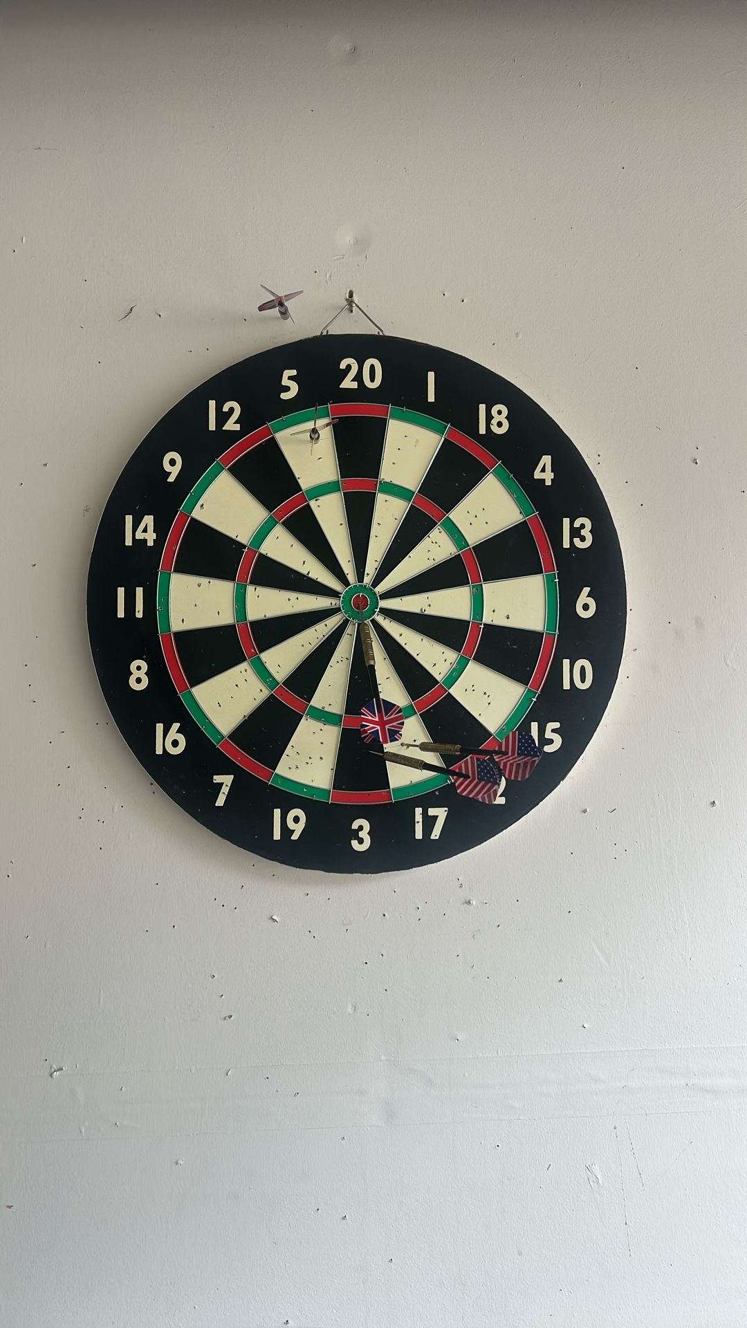 Dart Board With 5 Darts