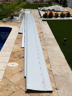 (4) Metal roof panels each approximately 20’ long and