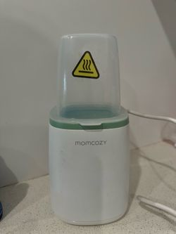 Mom cozy milk bottle warmer