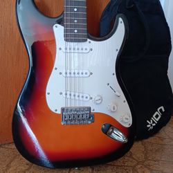 Ion Sunburst Electric Guitar And Carry Backpack
