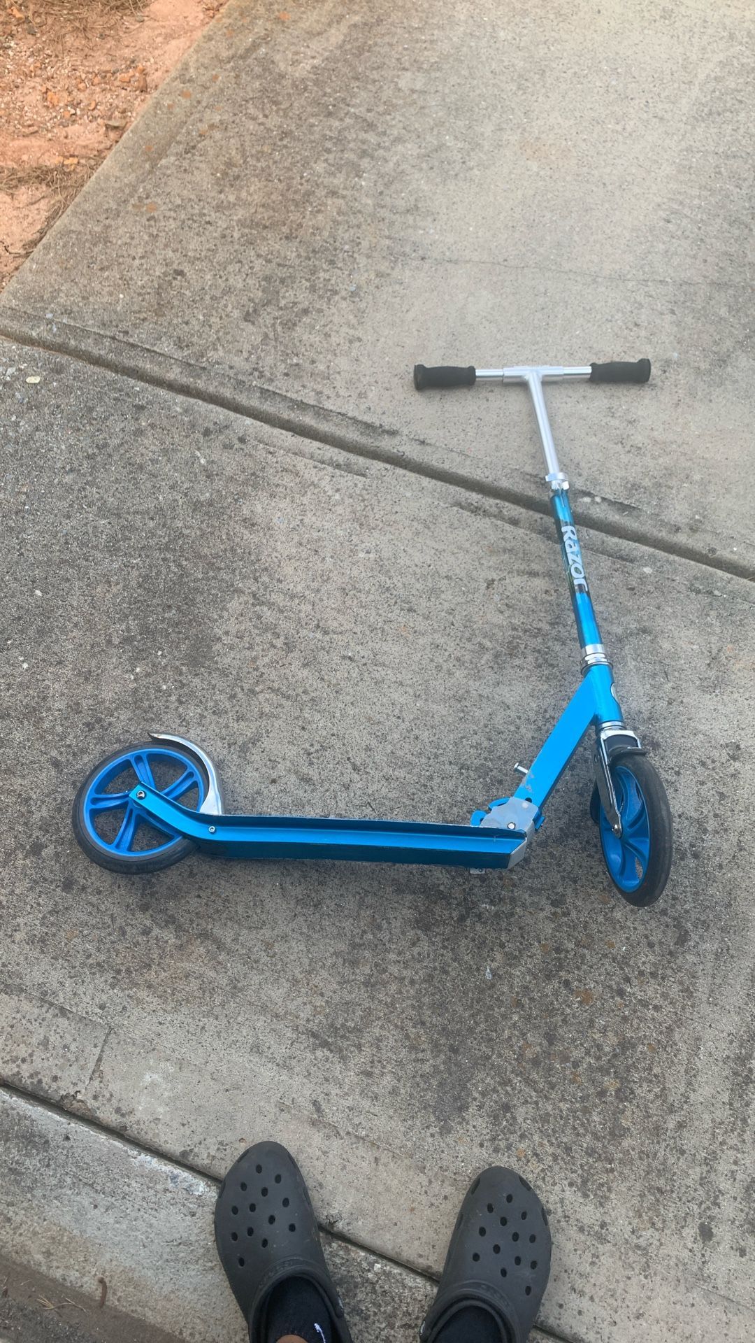 Blue Razor scooter — still rides smooth, brakes work fine. No rust. Just don’t use it anymore. (cash only$20 must meet austell mableton lithia springs
