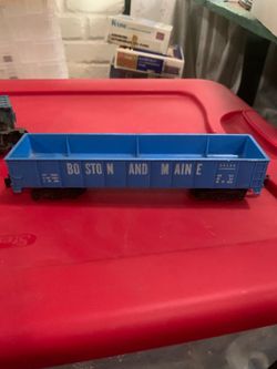 This is a vintage Gilbert American Flyer #24124 Boston & Maine Gondola train car, produced in the early 1960s.