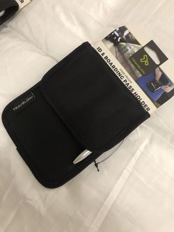 ID and boarding pass kit Brand New. I have 3. Never used