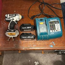 Makita Impact Drill 2 batteries  & charger