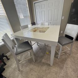 High  Dining Table And 8 Chairs 