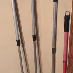 Set of four twist and pull garden tools rake shovel