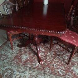 Antique Mahogany Ball And Claw Dining Table And 8 Chairs   $560