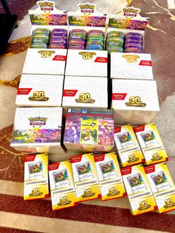 Pokemon card 30th celebration collection boxes and tins