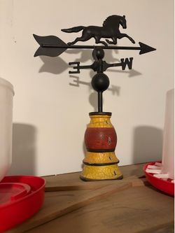 Antique show I got a old 1900 s side table and Ga poster as well as our wether rooster