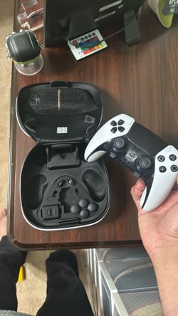 Dual sense Edge PlayStation controller with case and accessories