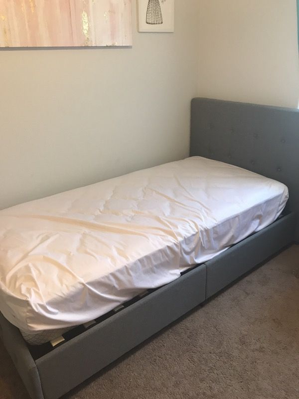Gray upholstered twin bed w/ mattress