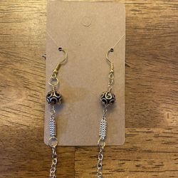Hand Crafted Earrings With Black Beads And Gold .