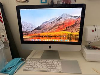 Apple IMac 21 inches Desktop with Apple keyboard and mouse