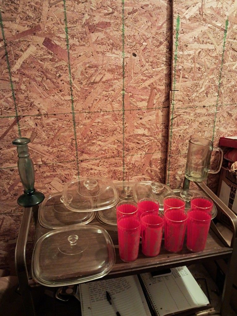 Box Lot Of Sixteen Assorted Pieces Drinking Glasses And Pyrex Lids And Candle Holder 