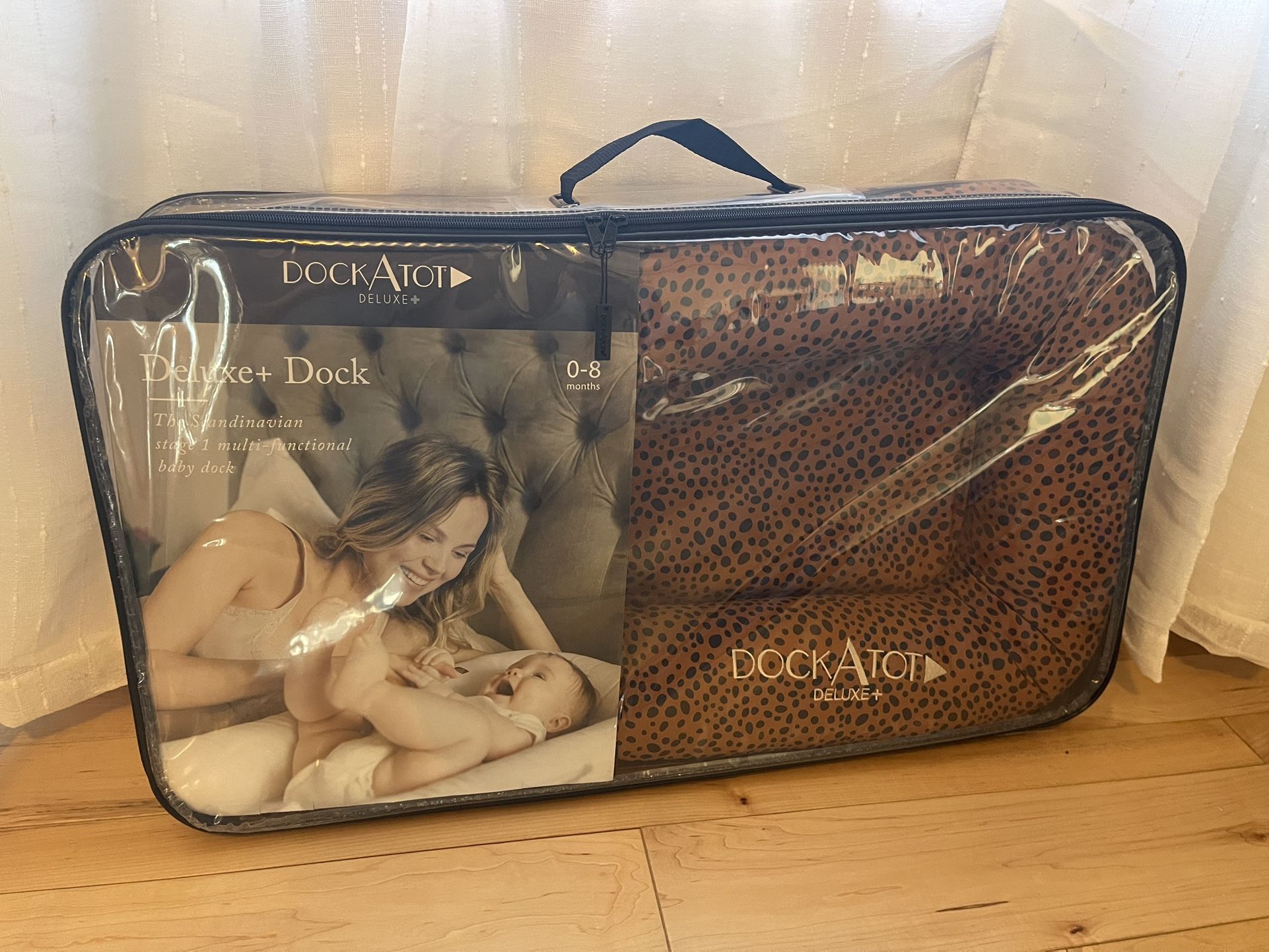 DockATot Deluxe+ Bronzed Cheetah + Toy Arch Bundle