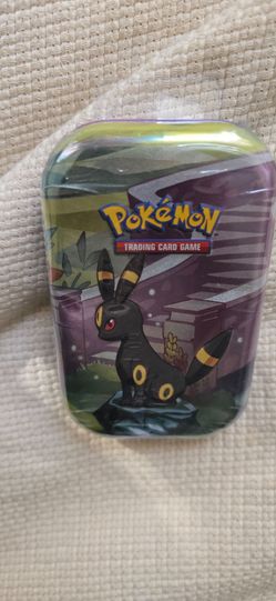 Prismatic Evolutions tins!