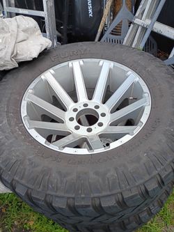Ford f-250 8 lug rims and tires 40x13.50x22