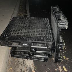 Seven Plastic Pallets 
